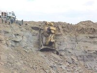 dozer over wall.jpg