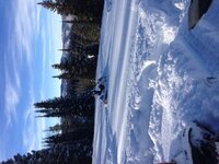 blue sky snow and sled.jpeg