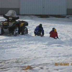 the boys riden the wheeler