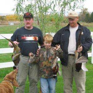 My nephews 1st Rooster Pheasant!! With my bro!!I'm on the left!