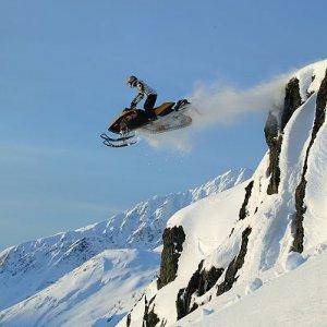 Ski Doo cliff jump I wish I was that stupid or good!!