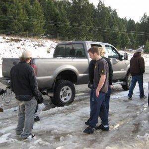 flat tire on Ians Super Duty atfer bein snowed in in Golden for 3 days!