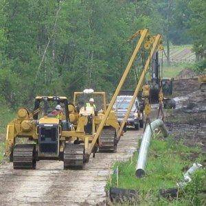 Carrying in a section for a wet land crossing.  12" natural gas line.  Landcaster MA.