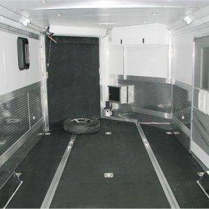 Triton custom interior. Black quad flooring is very popular and very strong.