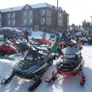 36 sled+39 riders+couple gallons of booze+hammer out trail=09 west yellowstone trip