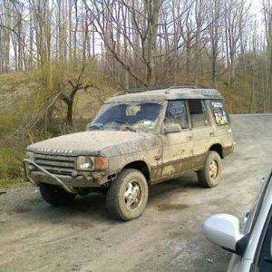 land rover with homade front hoop, not finished just after mudding