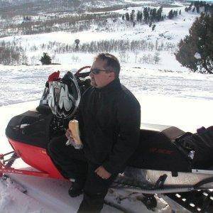 First trip out on the new sled. Eating a sandwich. 2010-2011