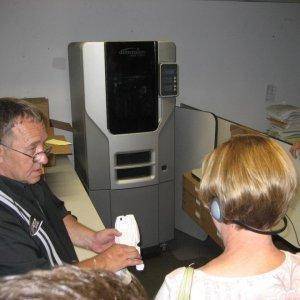 This is a 3-D plastic copy machine. Whatever you scan in, it makes an exact plastic copy. How cool is that?