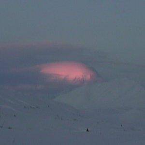 mtn mckinley with glowing clouds