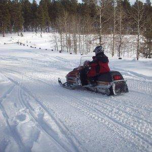 Son riding the old yamy