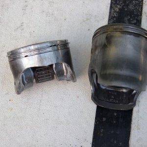 piston skirt dropped into crankcase