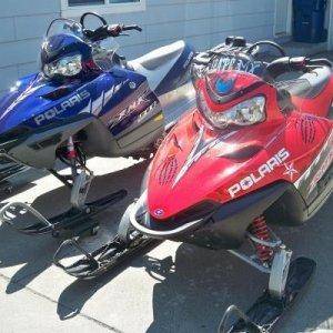 Left is hubby's sled 05' 900 RMK IQ 166" Track 50th anniversay edition; Mine is on the left