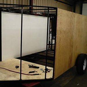 One piece 6' x 12' composite sidewalls stiffen the structure and keep weight down...   trailer weighs only 1100 lbs empty!