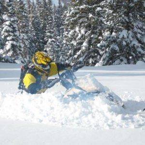 Andris, after a beautiful carve in the powder. Deep stuff!
Janette taking the pic