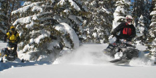 Andris and Spence riding through a beautiful area