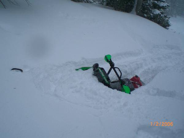 Buried my sled by Miller Creek in December.