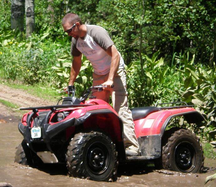 cris playing in the mud, sunridge 2009