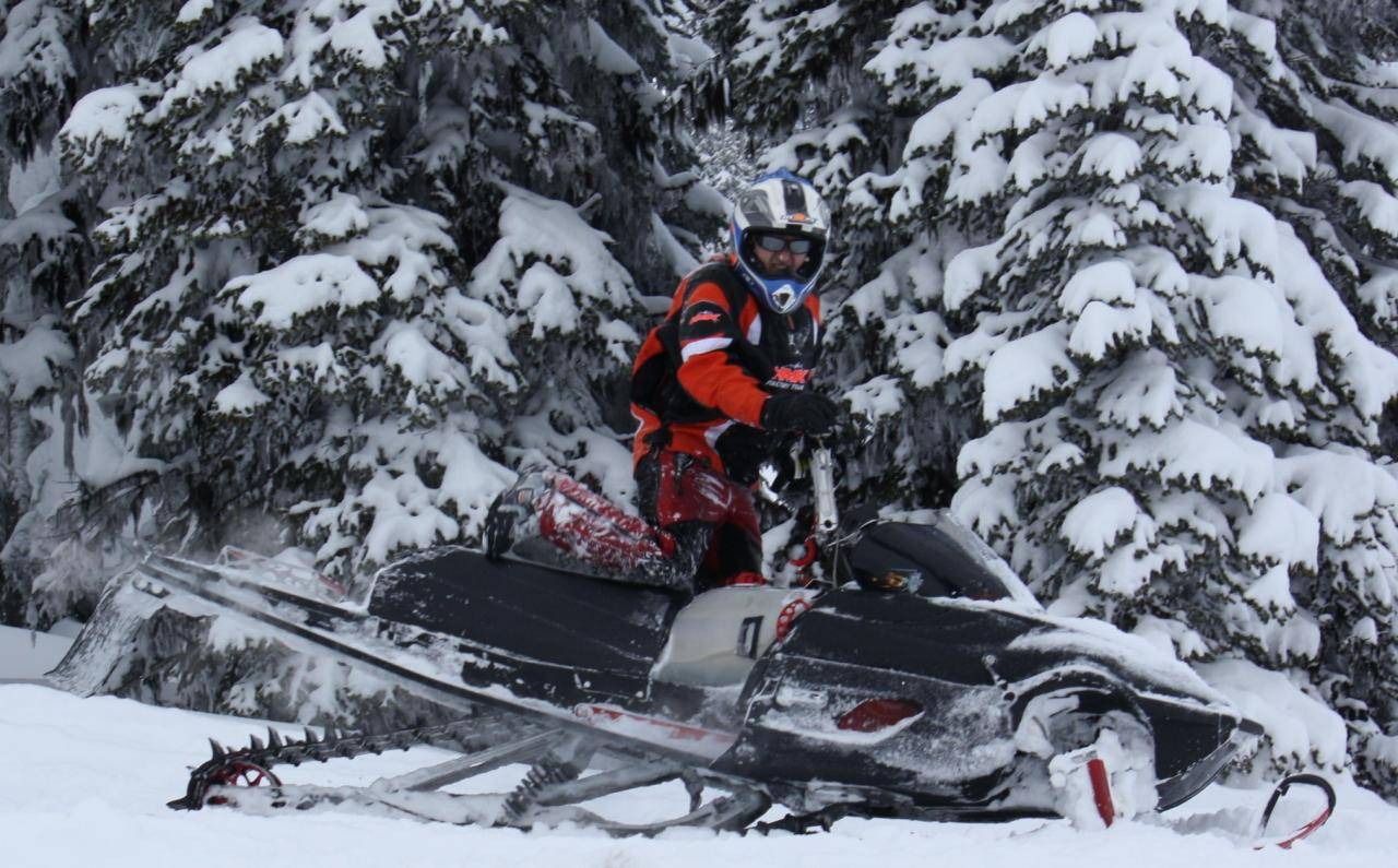 Dad's Hollywood pose. Nice sled too!