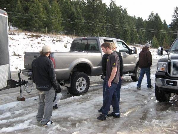 flat tire on Ians Super Duty atfer bein snowed in in Golden for 3 days!