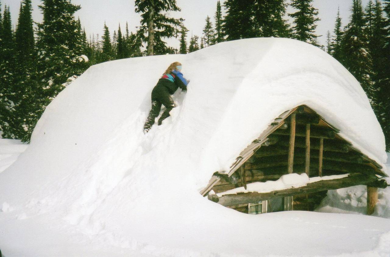 going up onto Wolverine Cabin to clean away snow from the stove pipe