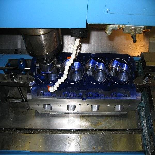 here I'm cutting the o-ring grooves in the heads on a cnc at my work to match the grooves cut in the deck surface of the block.