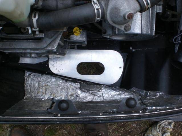 I made a muffler plate to fill in where the old twin exhaust hole was and make a new outlet for the muffler.