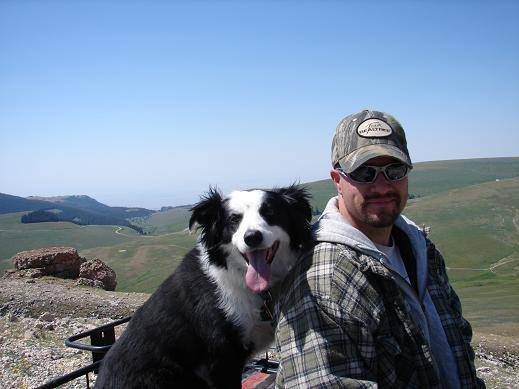 Me &amp; the dog on the ATV (I am in the hat)