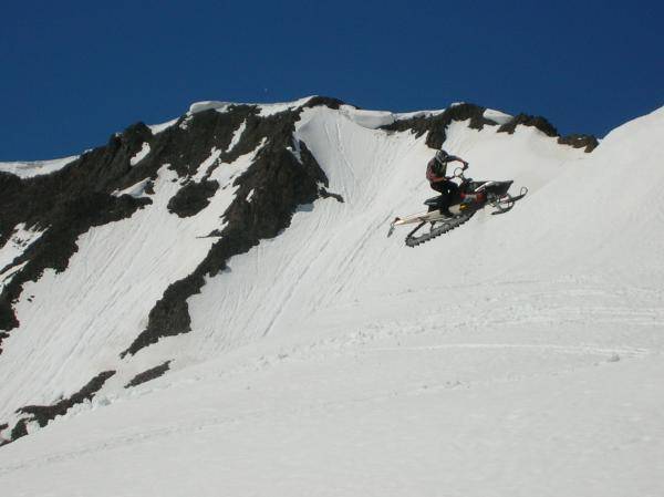 My buddy Cory catchin air in Cooke City, June 21 08