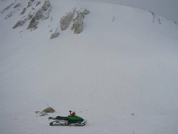 My new sled below the widow maker! If you look close you can see Nate's sled on the rocks above.... He tried to climb and sidehill from the right to t