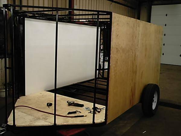 One piece 6' x 12' composite sidewalls stiffen the structure and keep weight down...   trailer weighs only 1100 lbs empty!