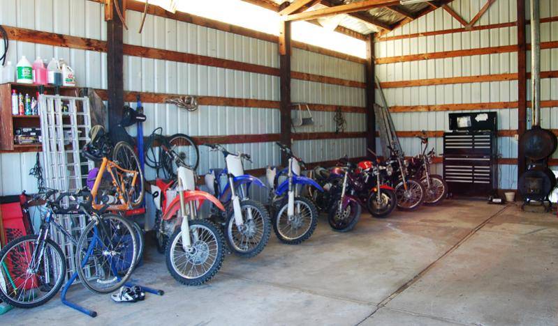 Our Shop

Left to right: Mtn Bike, Road Cycle, Honda, Yamaha, Yamaha, Project bike, Suzuki, Harley, Harley, Tool Box and wood burning stove for those 