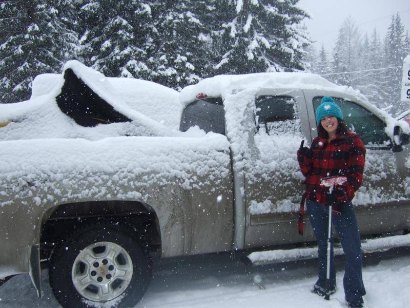 Outside of Big Eddy's in Revy brushing off the snow from my truck!  Look how much fell while I was just having breaky!  :)