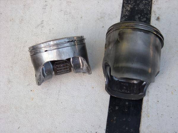 piston skirt dropped into crankcase