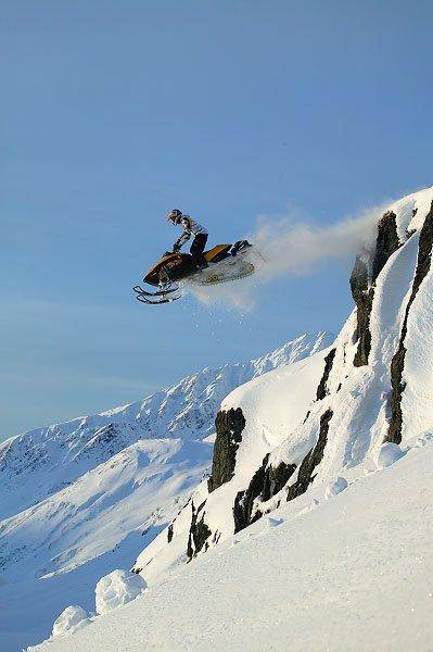 Ski Doo cliff jump I wish I was that stupid or good!!