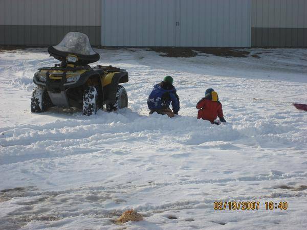 the boys riden the wheeler