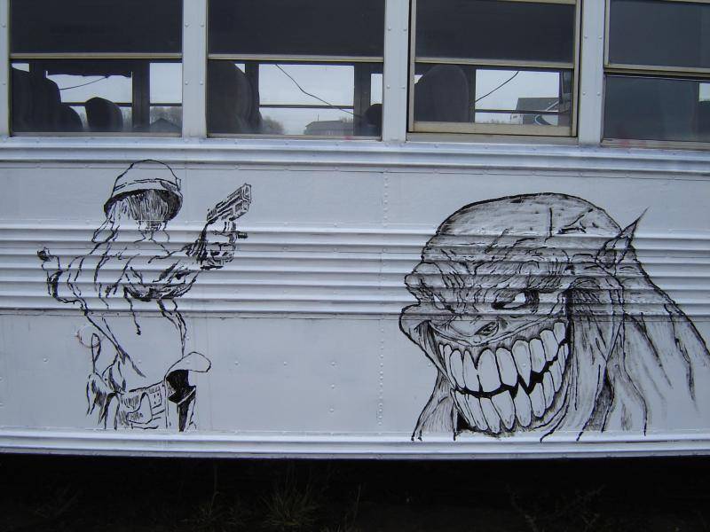 The bus  I painted with a can of tremclad and a brush