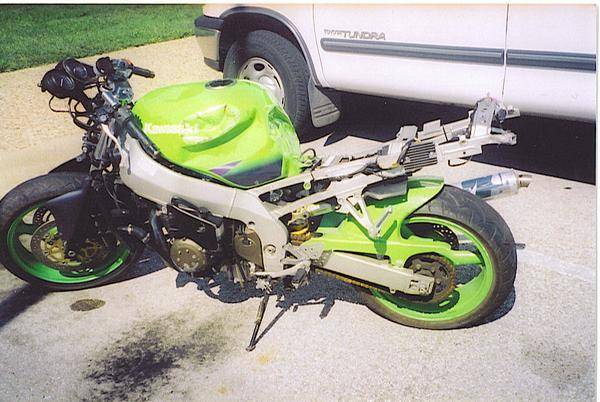 The day I bought the bike..notice subframe bent, broken.