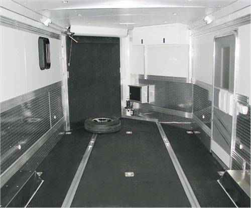 Triton custom interior. Black quad flooring is very popular and very strong.